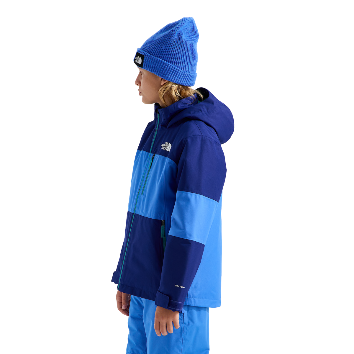 Side view of The North Face Boys Freedom Insulated Jacket in Bold Blue with insulated construction, adjustable cuffs and attached hood