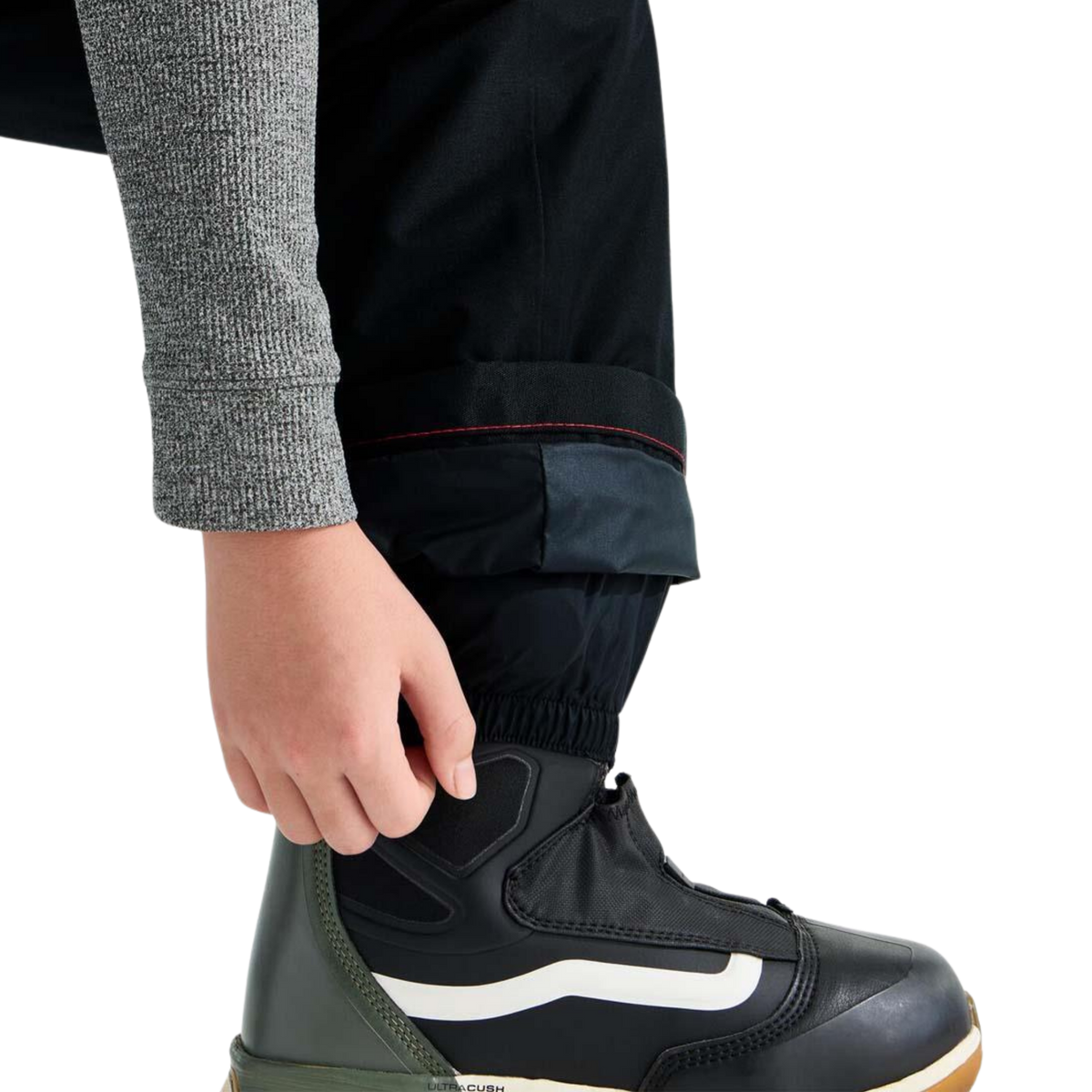 The North Face Boys Freedom Insulated Pant in Black with integrated leg gaiter designed to help limit snow entry around winter boots