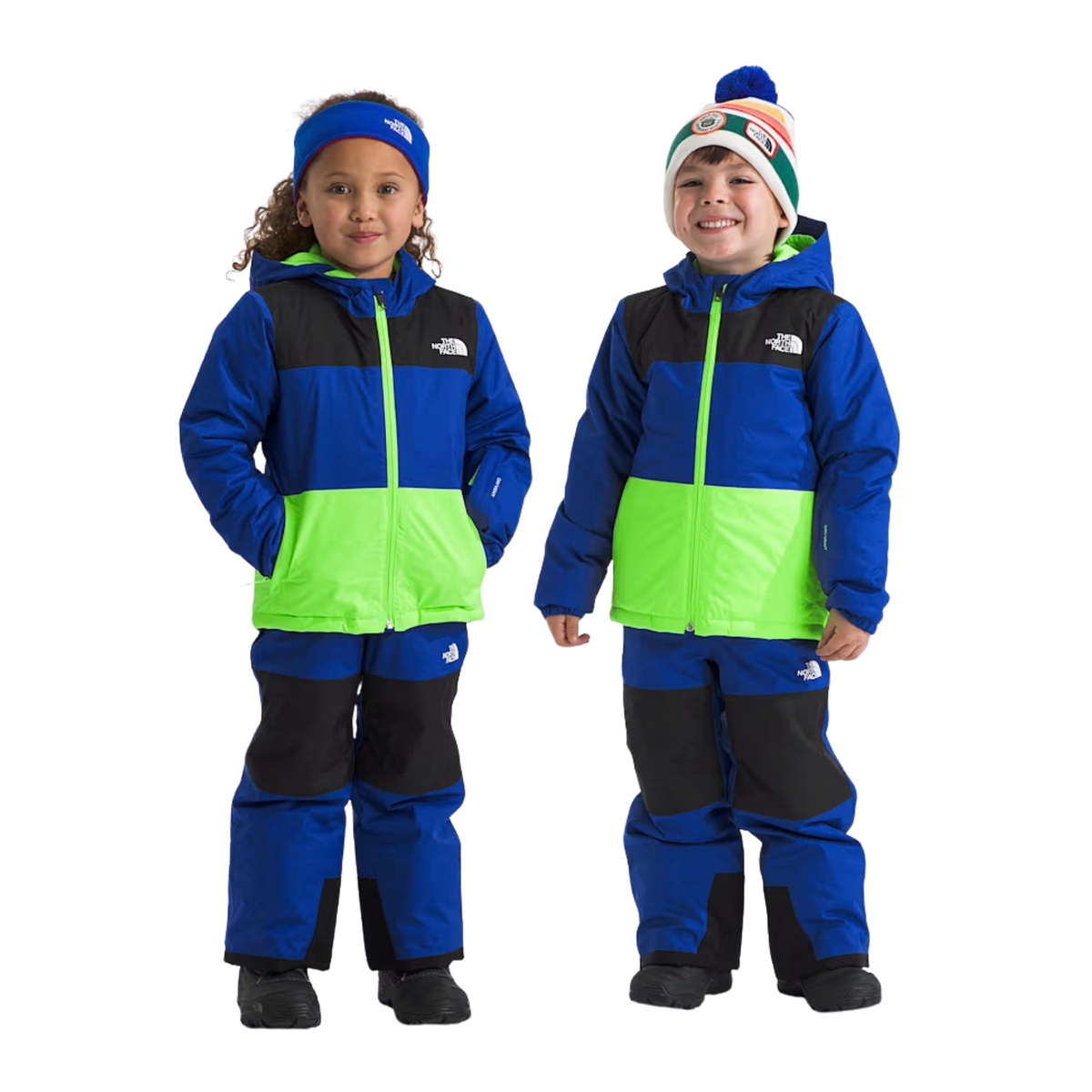 Child wearing The North Face Kids Freedom Insulated Jacket in TNF Blue with waterproof DryVent protection and Heatseeker Eco warmth while skiing in Whistler