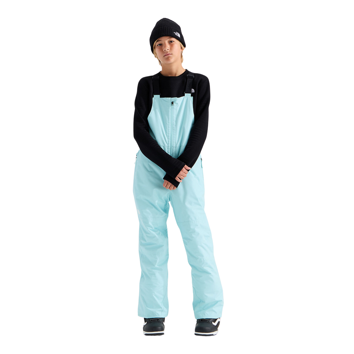 Front view of The North Face Teen Freedom Insulated Bib Pant showing adjustable suspenders, bib construction and reverse-coil centre-front zipper