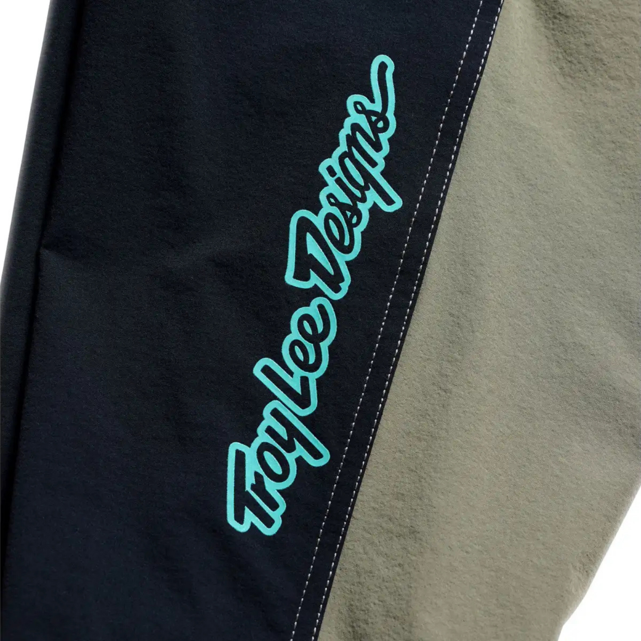 Close-up of Troy Lee Designs Skyline Trail Pant Mono Army Leg part with the logo design