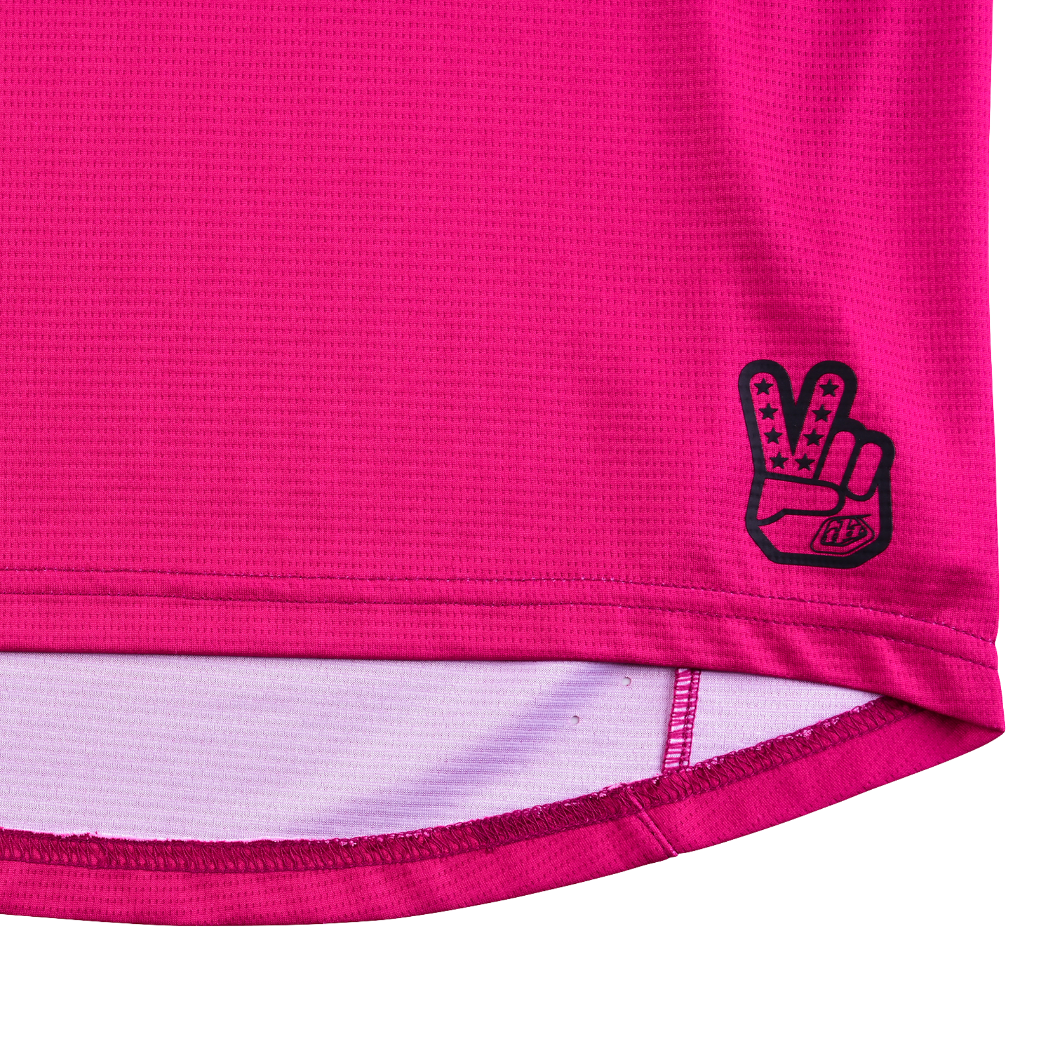 Close-up of Troy Lee Designs Youth Sprint Jersey featuring laser-cut ventilation and durable 165gsm fabric in Icon Berry
