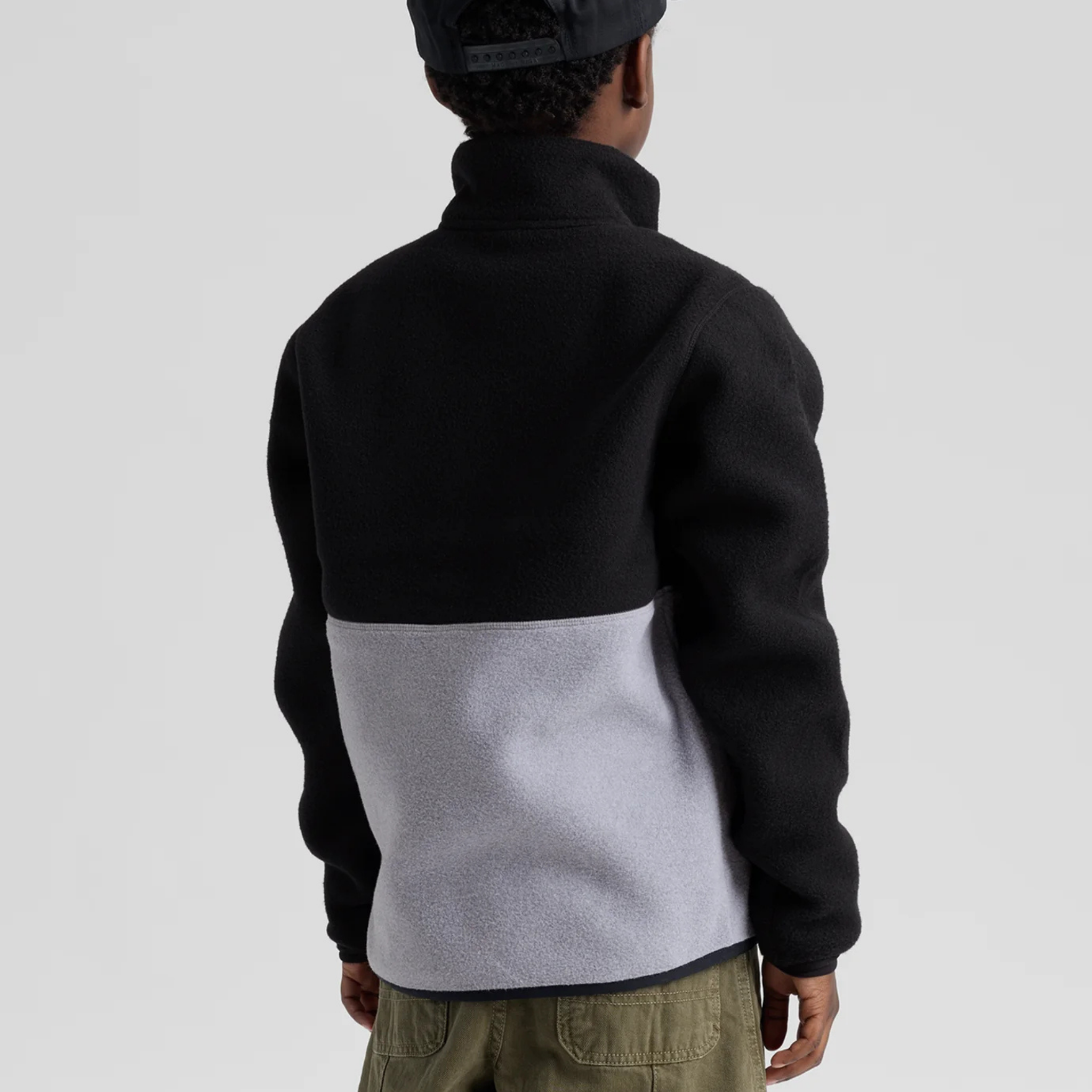 Back view of Burton Kids Cinder Fleece Anorak in True Black and Grey Heather with soft recycled polar fleece
