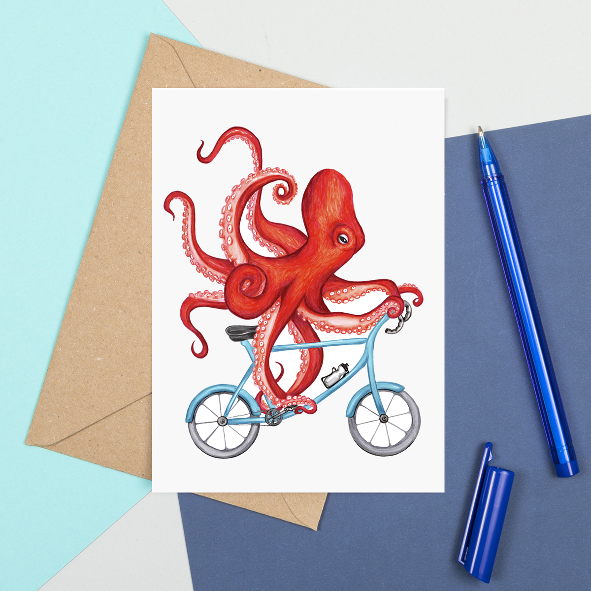 Octopus riding a bike Greeting Card