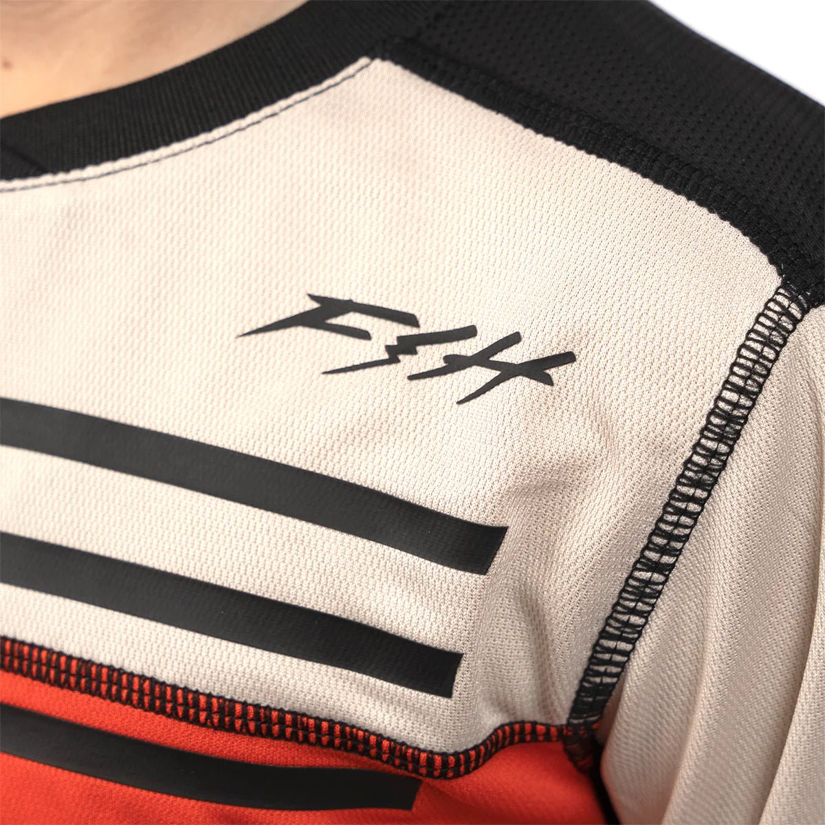 FastHouse Youth Sidewinder Alloy Long Sleeve Jersey - Mountain Kids Outfitters: Cream Red, Close-up View