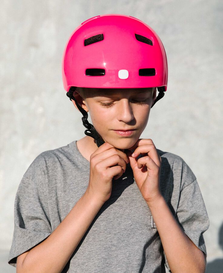 POCito Crane MIPS Bike Helmet - Mountain Kids Outfitters: Fluorescent Pink, Lifestyle View