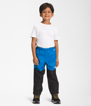 The North Face Kids Antora Rain Pants in Sonic Blue - Smiling kid with a full front view of the rain pants.